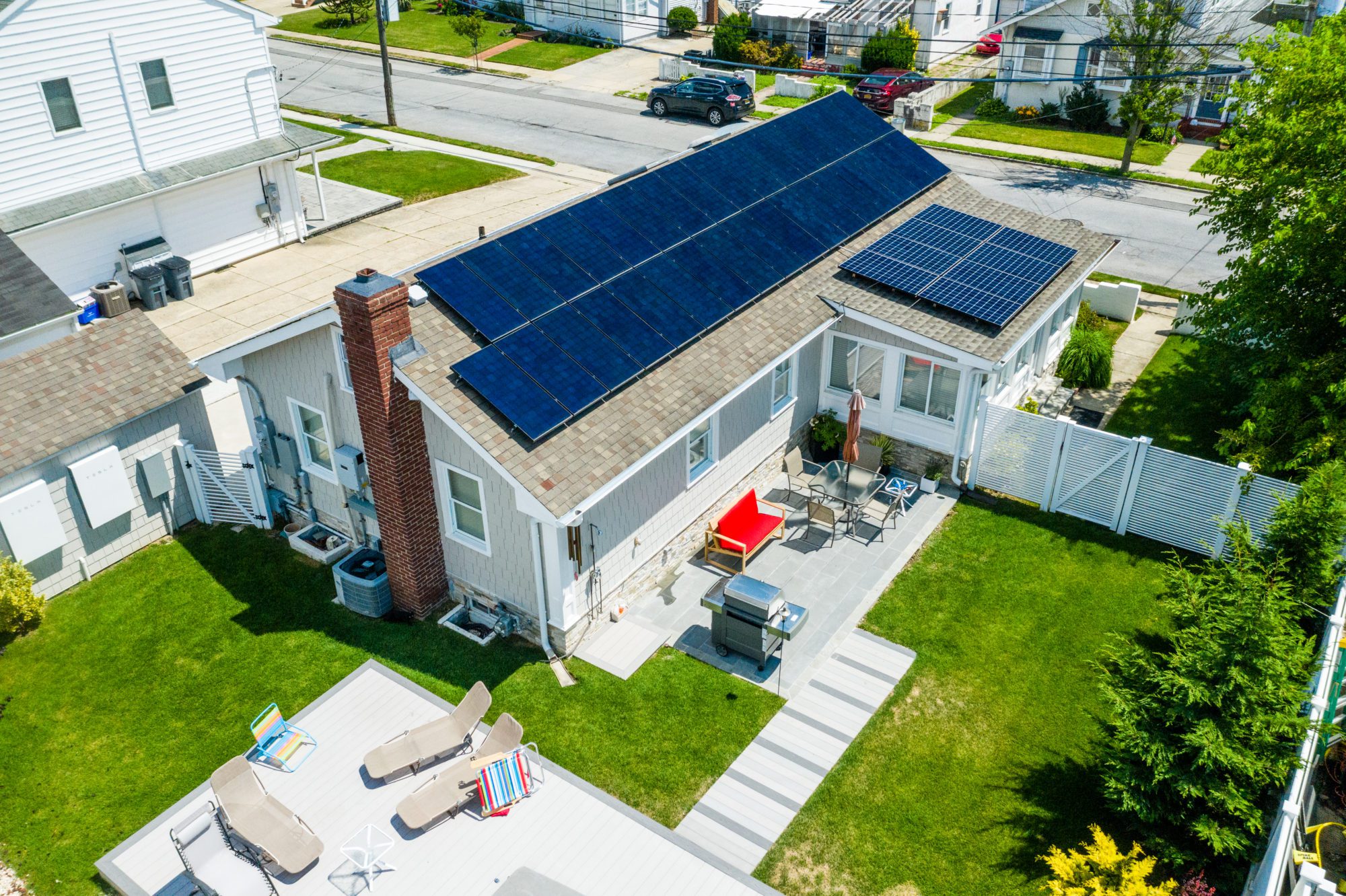 A house on Long Island has solar panels on the roof. Fall is the perfect time to learn more about renewable energy and go back to school with solar.